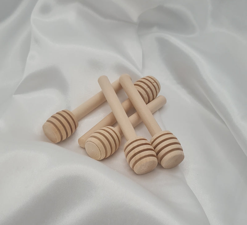 "Elevate Your Sweet Moments with Our Handcrafted Wooden Honey Dipper – Nature's Perfect Companion for Drizzling Delight!"