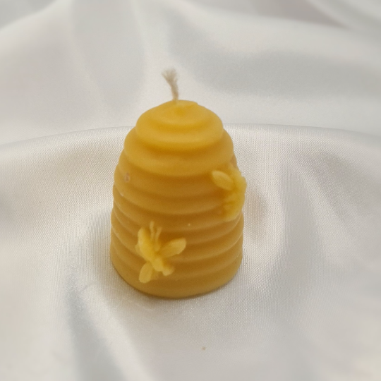 "Beehive Bliss: Illuminate Your Space with the Sweet Glow of 100% Beeswax"