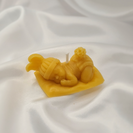 "Heavenly Glow: Illuminate Your Space with the Cherub Baby Beeswax Candle"